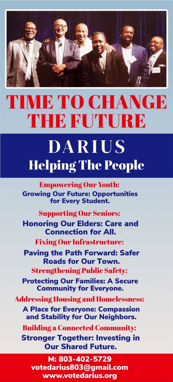 Darius Robinson standing with fellow community leaders